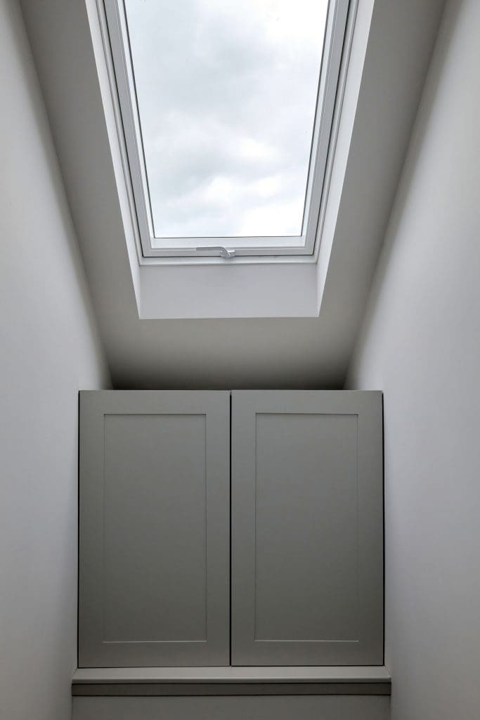 loft conversion small landing with floor to ceiling built-in units